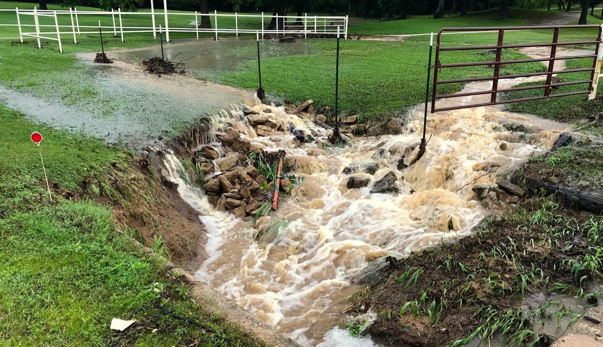 Heavy rains flood county roads